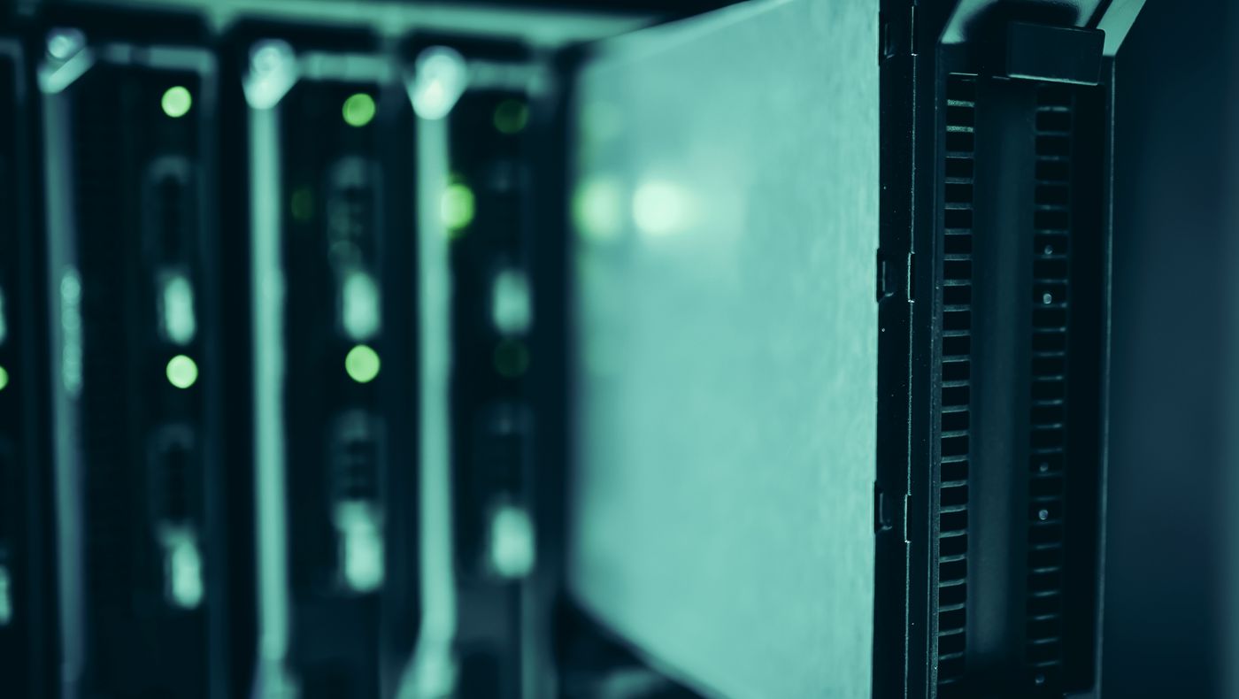 Racks of servers in a data centre aisle